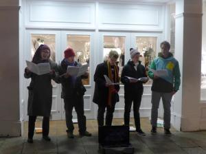 Singing outside The White Company